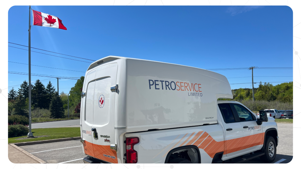 Petro Service Limited Truck in front of the Canadian Flag